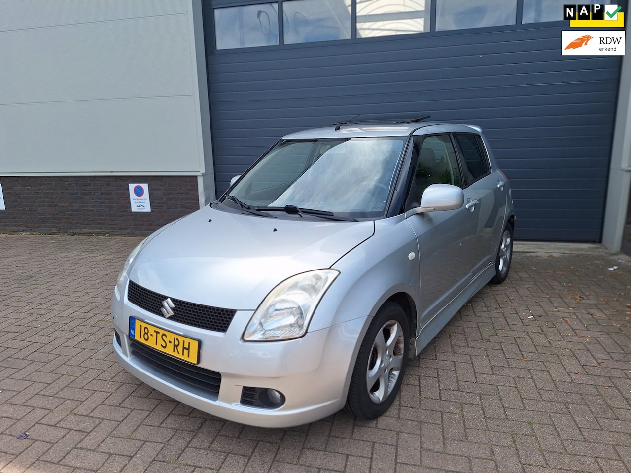Suzuki Swift - | 1.5 Exclusive | Open dak | Automaat | Stoelverwarming | - AutoWereld.nl