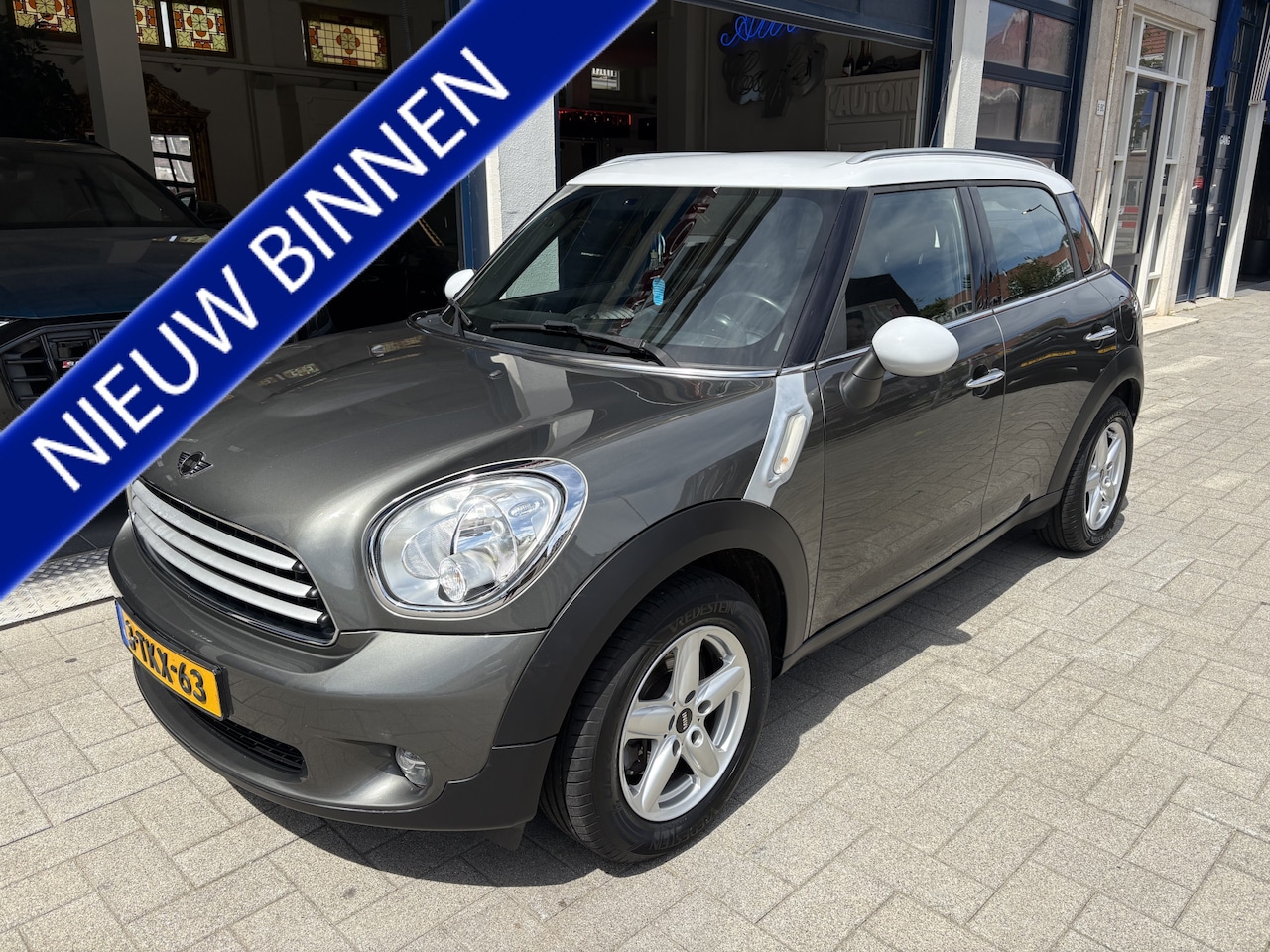 MINI Countryman - 1.6 Cooper NL AUTO/CLIMA/NAVI/DEALER OND. - AutoWereld.nl