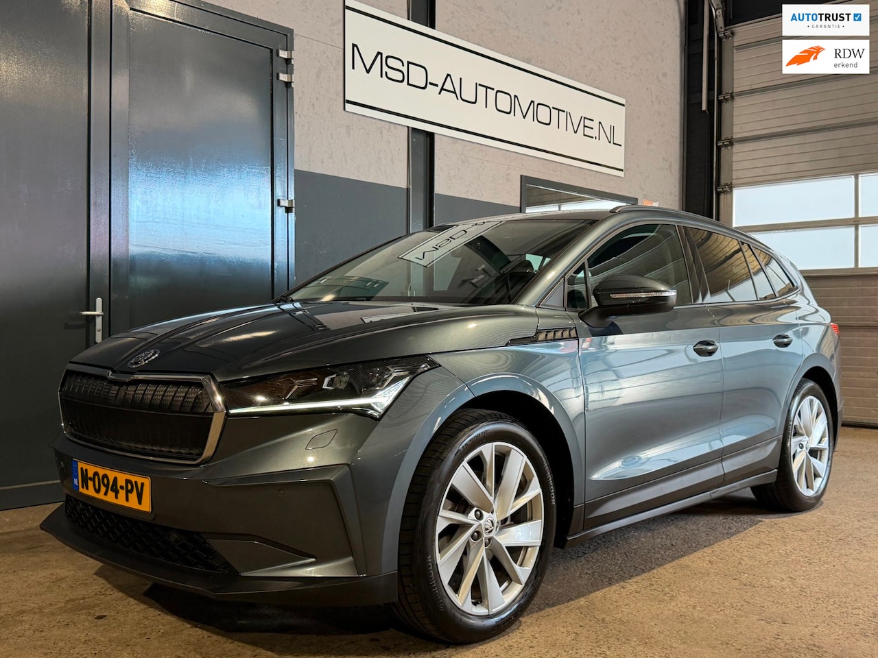 Skoda Enyaq iV - 60|Camera|Stuurverwarming|Carplay|SOH 89.4% - AutoWereld.nl