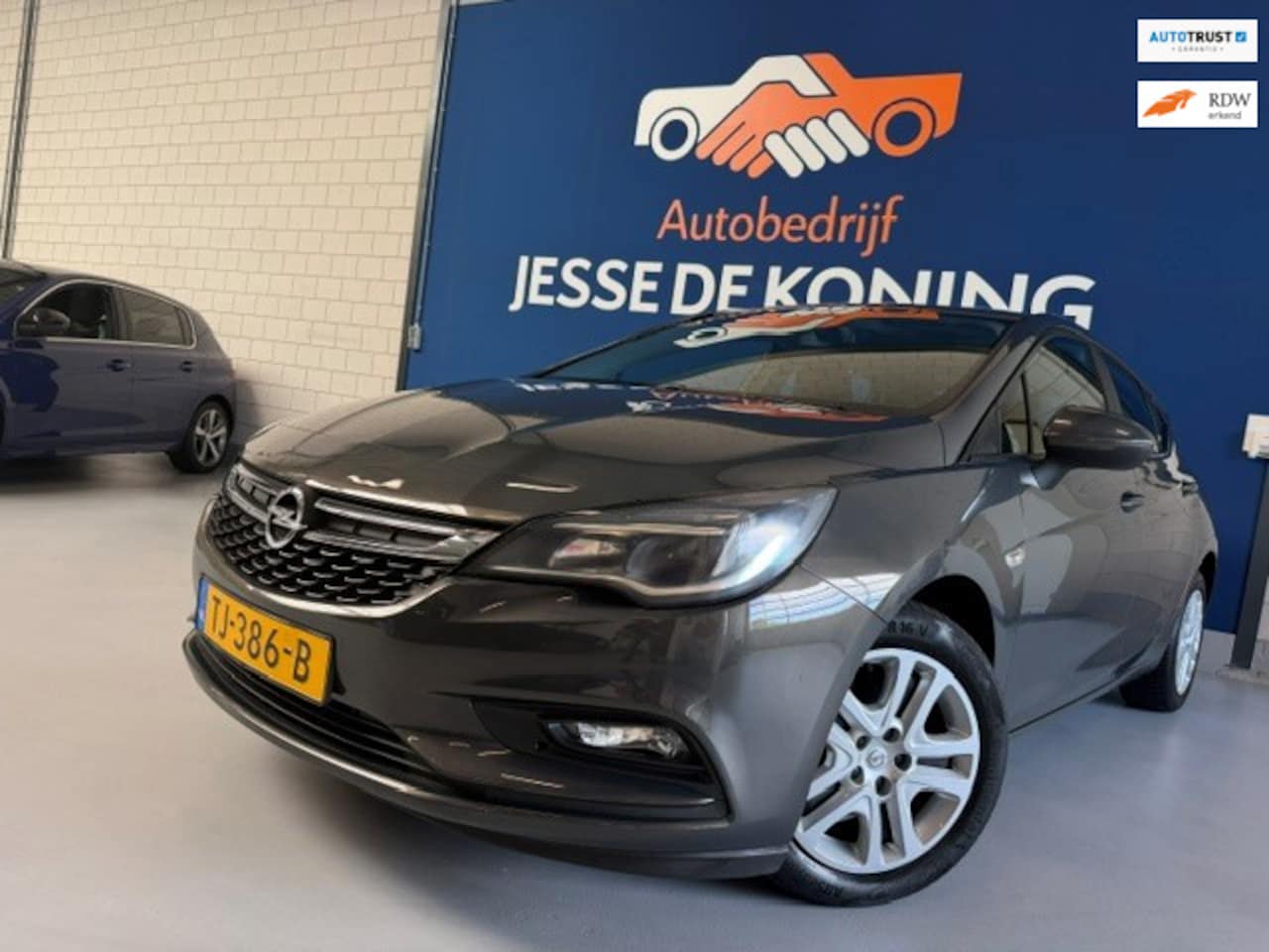 Opel Astra - 1.4 Turbo S/S / bj.2016 / 5 deurs / kleur: grijs / carplay / navigatie / climate/ NAP met - AutoWereld.nl