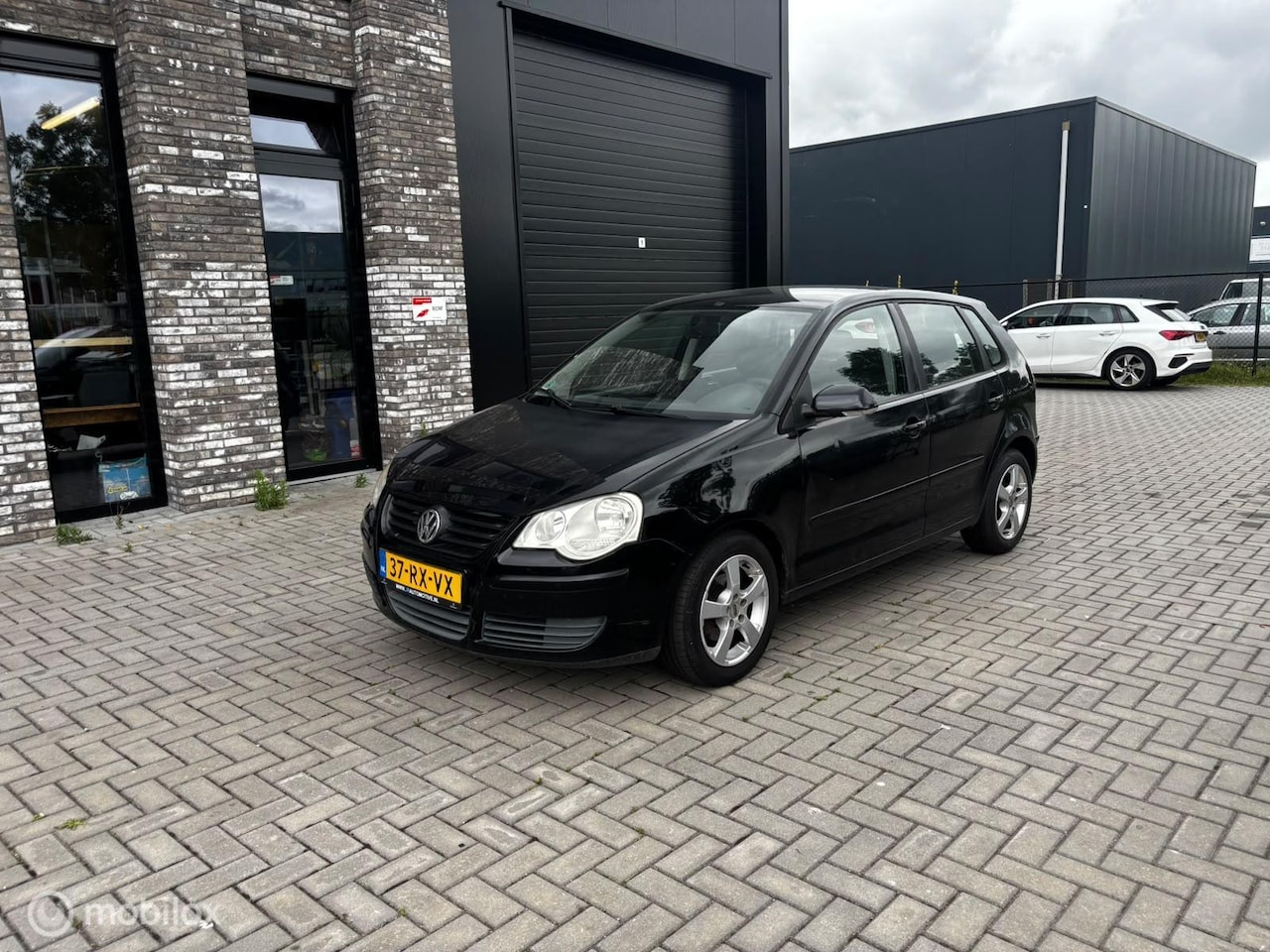 Volkswagen Polo - 1.4-16V Sportline 1.4-16V Sportline - AutoWereld.nl