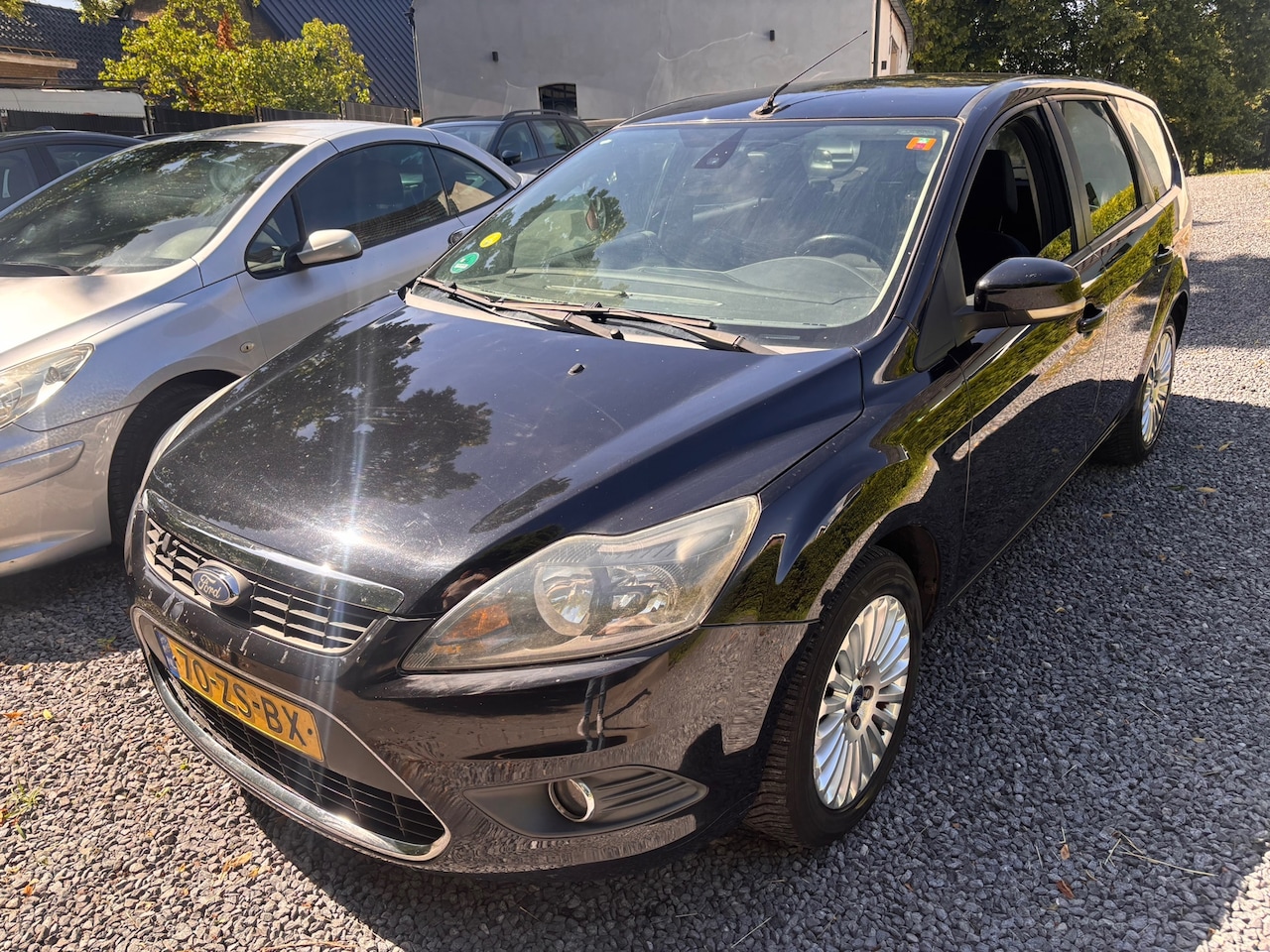 Ford Focus Wagon - 1.8 Titanium Flexi Fuel AIRCO NAVIGATIE - AutoWereld.nl