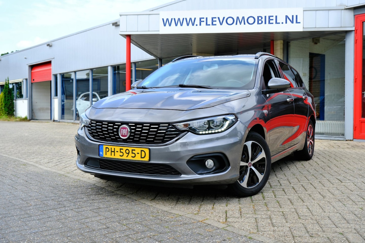 Fiat Tipo Stationwagon - 1.6 MultiJet 16v Business Lusso Leder|Navi|Clima|Cruise|LMV - AutoWereld.nl