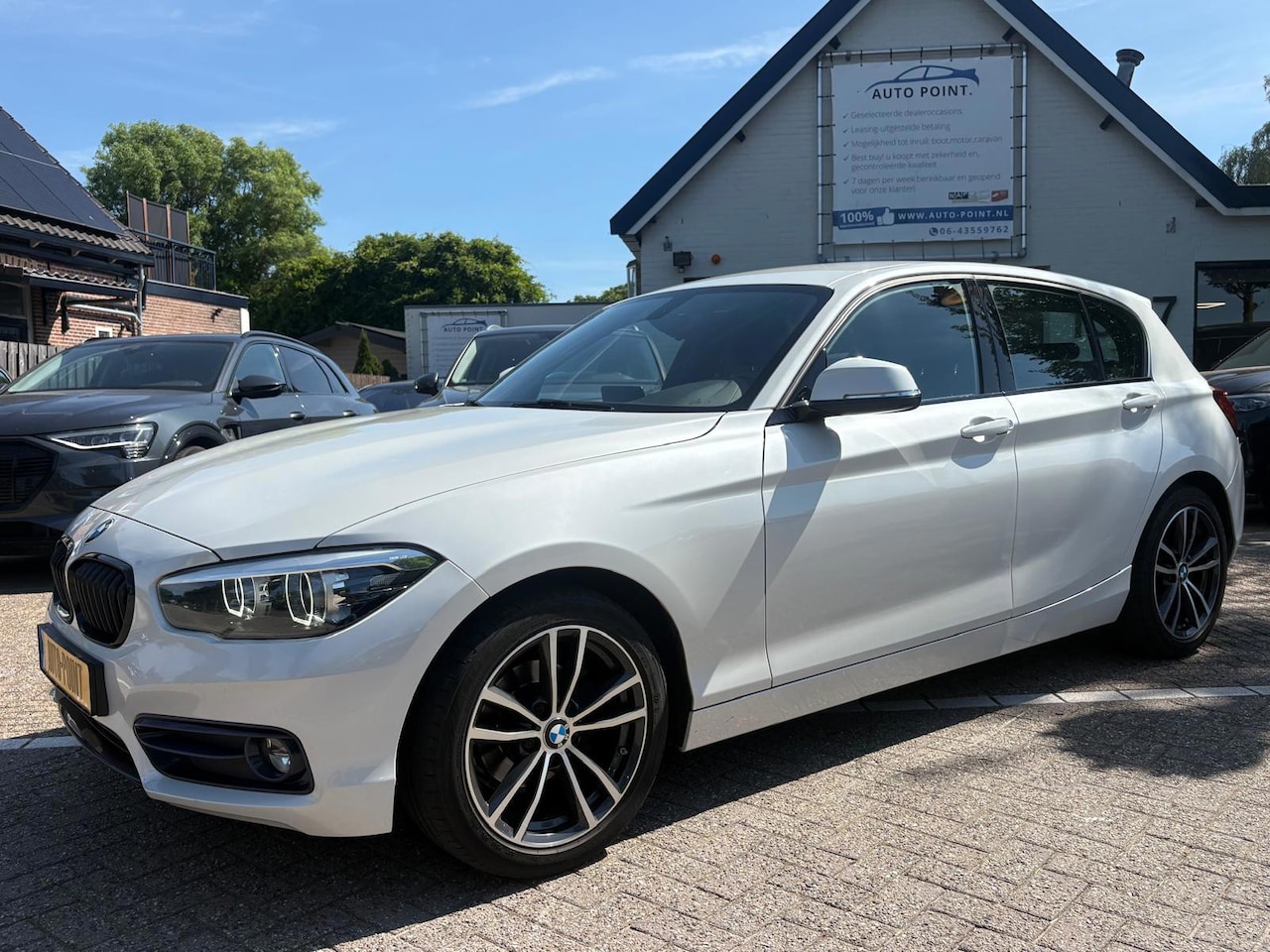 BMW 1-serie - 118i SPORT EDITION/NAVI/CRUISE/DEALER ONDERHOUDEN - AutoWereld.nl