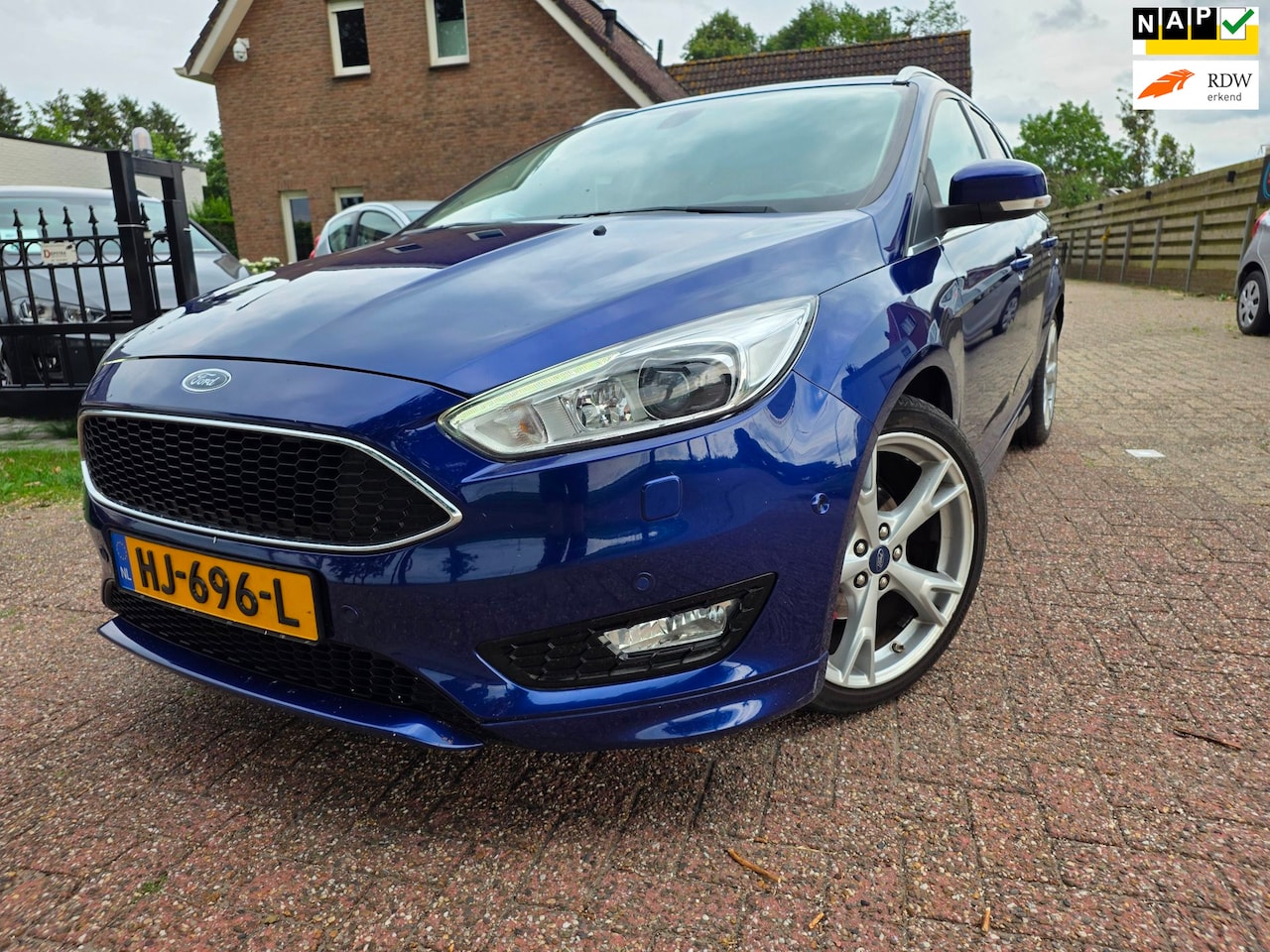 Ford Focus Wagon - 1.0 Titanium Edition 1.0 Titanium Edition, Clima, PDC, Stoel verw, Stuur verw - AutoWereld.nl