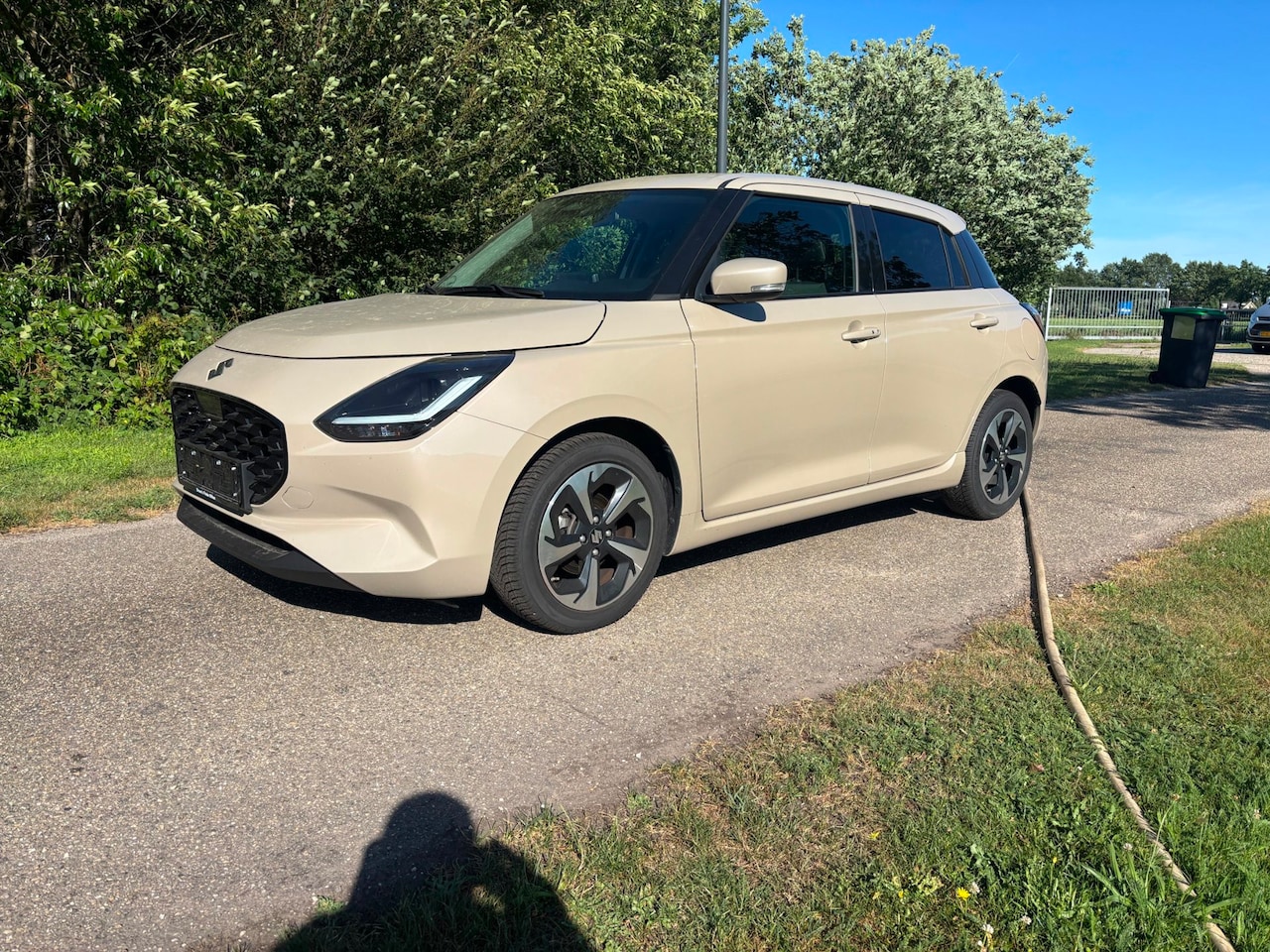 Suzuki Swift - 1.2 Style Smart Hybrid 7200km - AutoWereld.nl