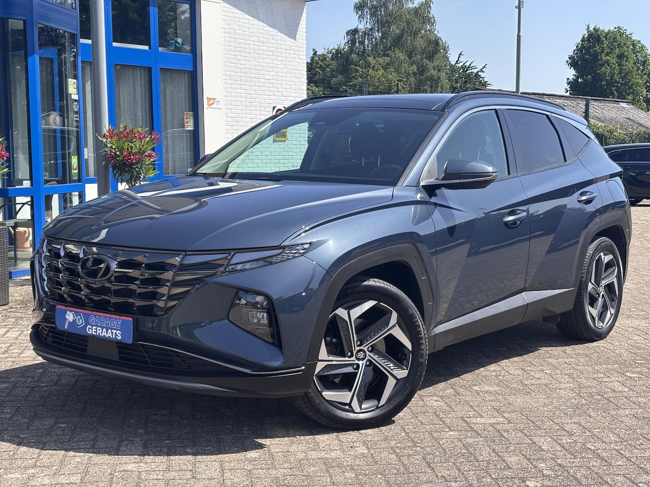 Hyundai Tucson - 1.6 T-GDI PHEV Premium 4WD l Panoramadak, Stoelverwarming, Adaptieve Cruise control, Camer - AutoWereld.nl