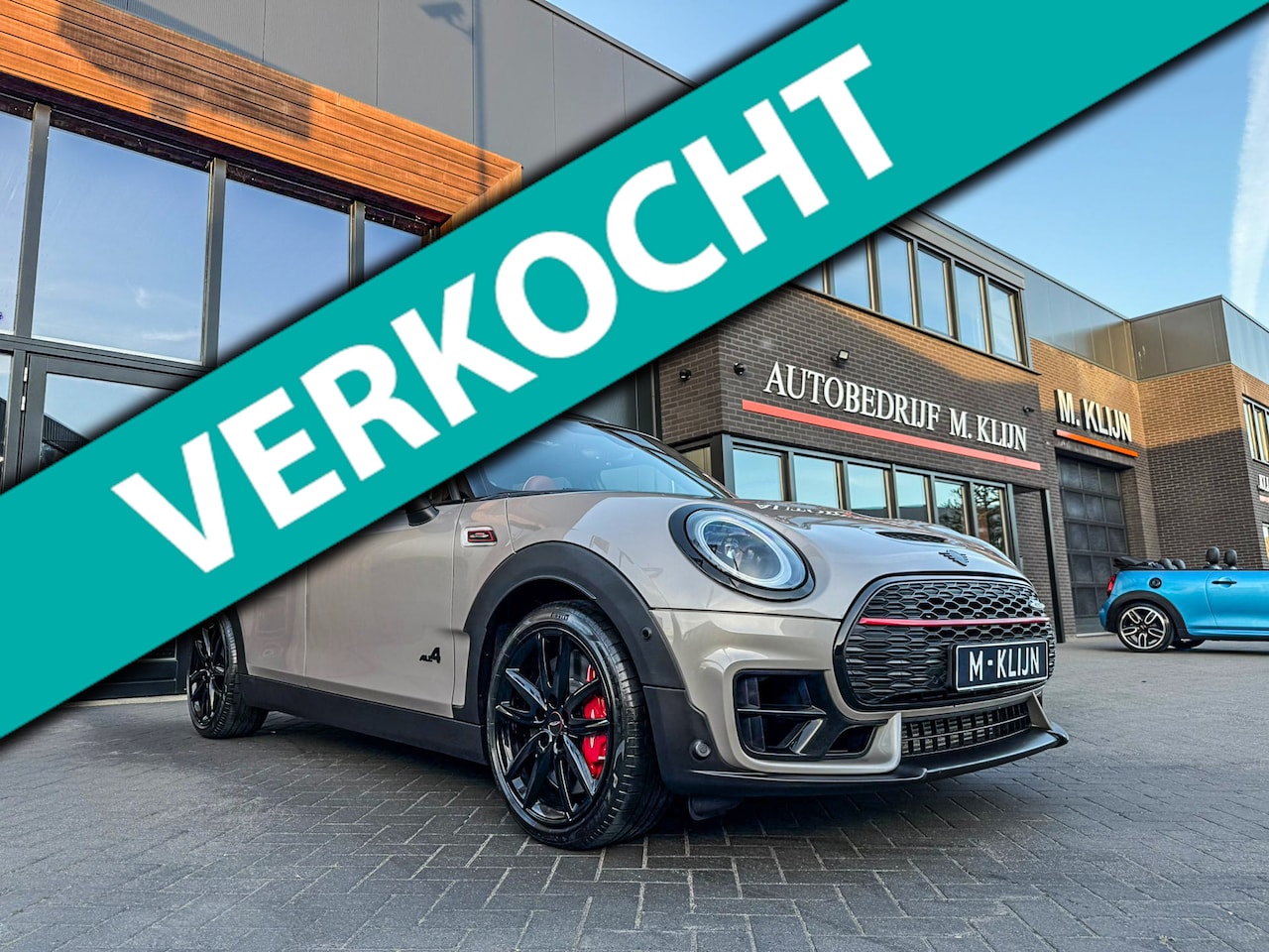 MINI Clubman - 2.0 JCW ALL4 John Cooper Works F1 aut 306pk Rooftopgrey/Bruin leer/Pano/Hk/Vol - AutoWereld.nl