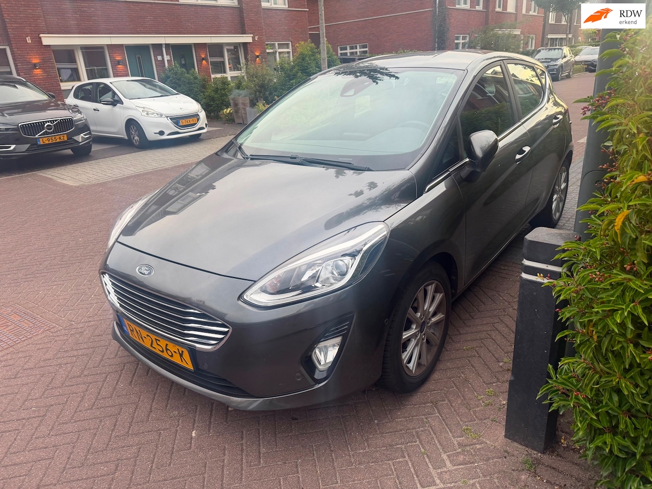 Ford Fiesta - 1.0 EcoBoost Titanium 5drs. Airco Cruise Navi - AutoWereld.nl