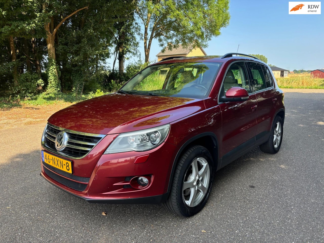 Volkswagen Tiguan - 2.0 TSI Track&Field 4Motion | Automaat | Leder - AutoWereld.nl