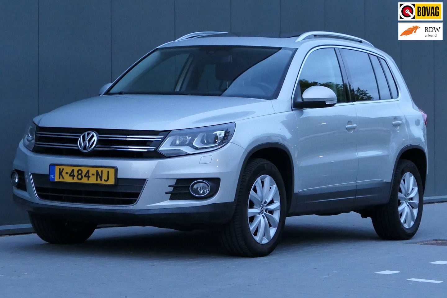 Volkswagen Tiguan - 2.0 TSI Sport&Style 4Motion Pano Cruise Navi Leder - AutoWereld.nl