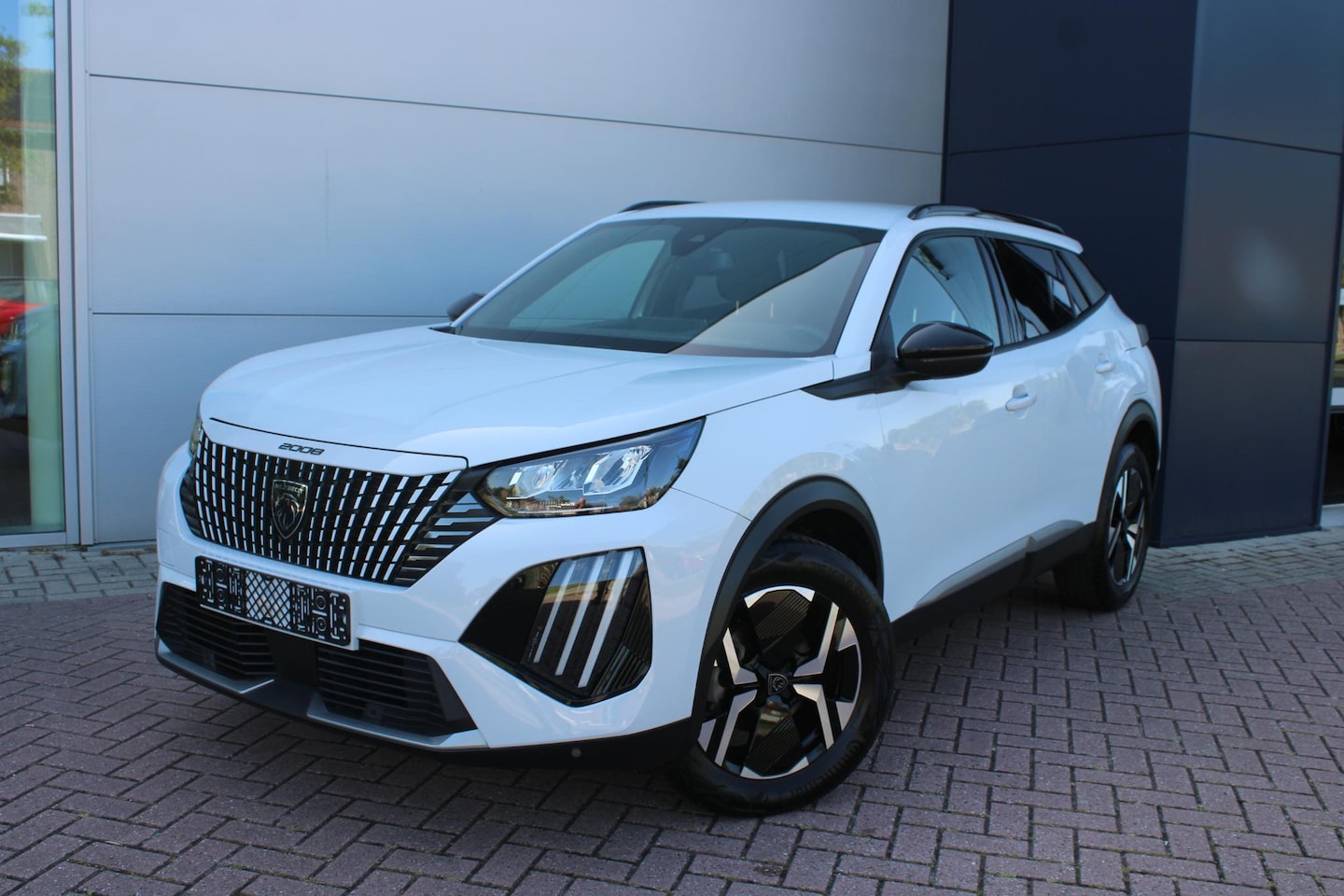 Peugeot 2008 - 1.2 PureTech 100pk Allure Airco Navi Camera Carplay 21.399km Zeer mooi - AutoWereld.nl
