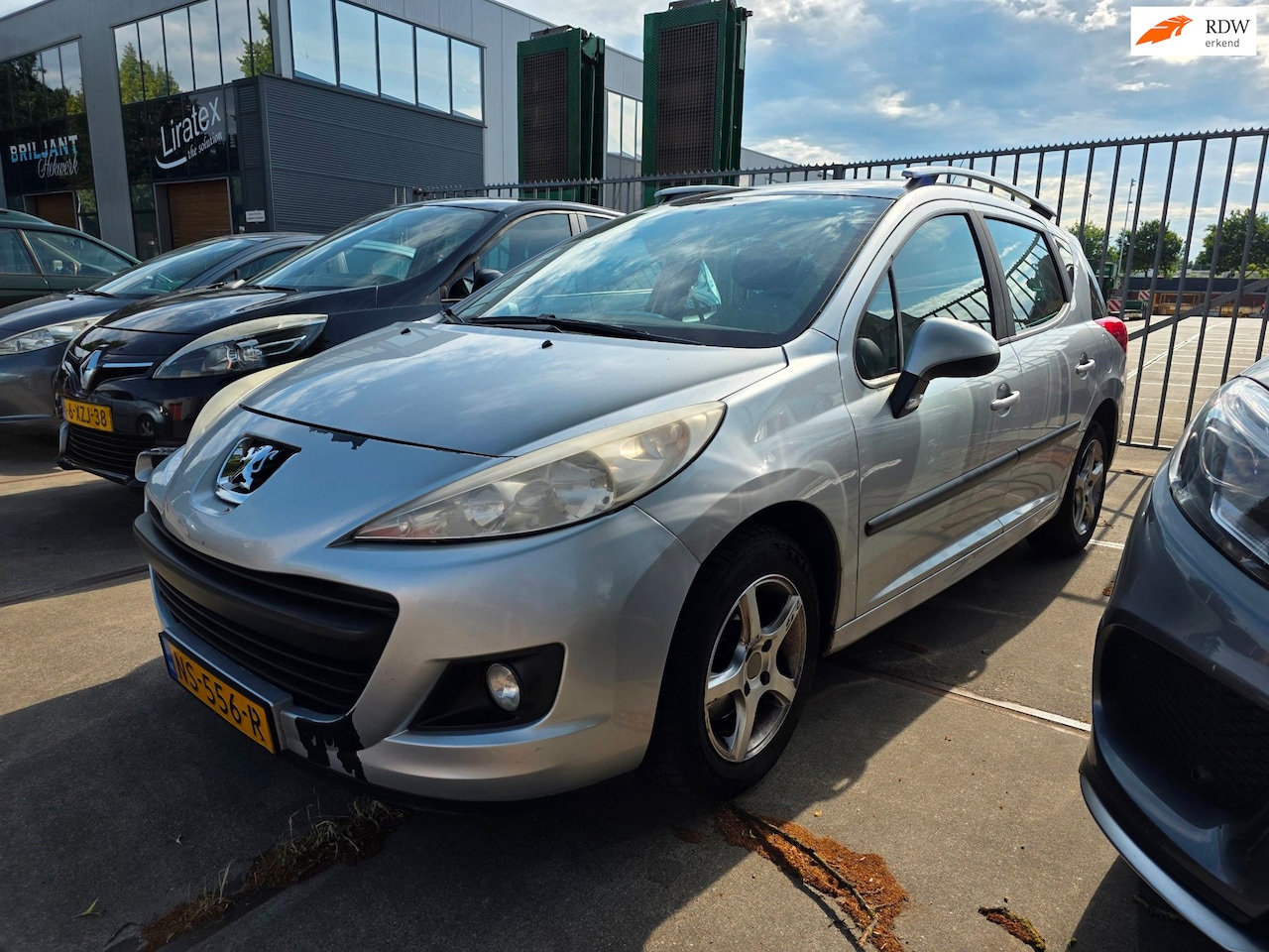 Peugeot 207 SW - 1.4 VTi Blue Lease Executive 1.4 VTi Blue Lease Executive - AutoWereld.nl