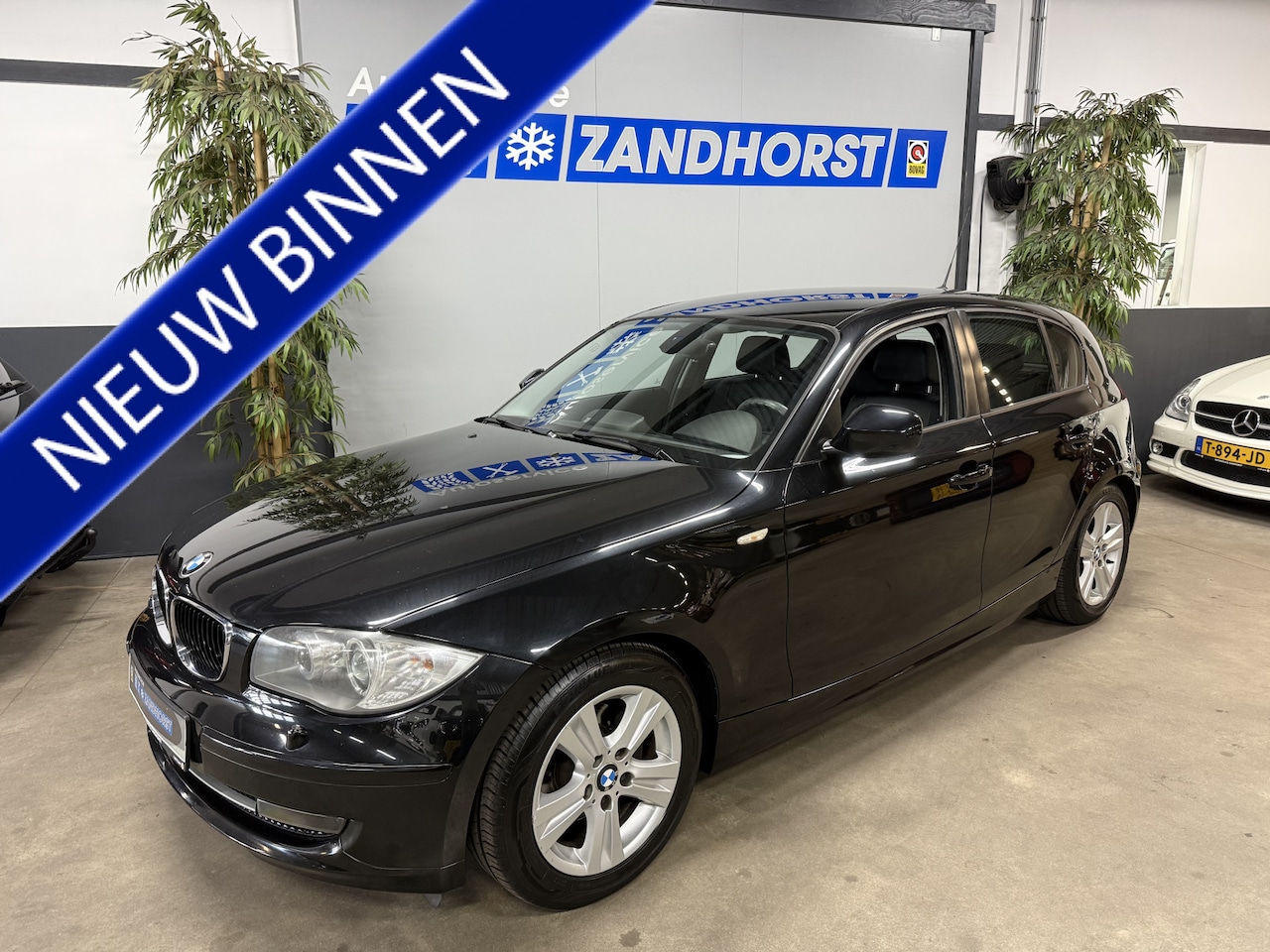 BMW 1-serie - 118i EffDyn. Ed. Business Line Ultimate Edition // Leer - AutoWereld.nl