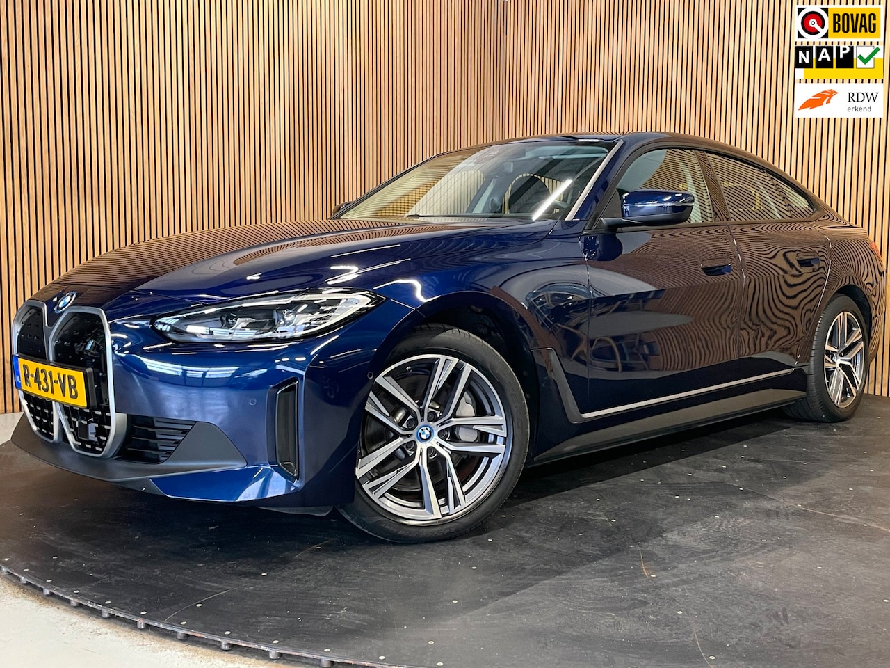 BMW i4 - EDrive40 High Executive 84 kWh|99% SOH|PANORAMADAK|HEAD-UP|ACC|MEMORY|VOLLEDER|CARPLAY|CAM - AutoWereld.nl