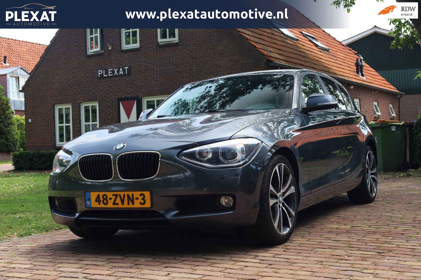 BMW 1-serie - 118i Upgrade Edition Aut. | Xenon | Lederen Stoelen | Airco | Navigatie | 17 Inch | Histor - AutoWereld.nl