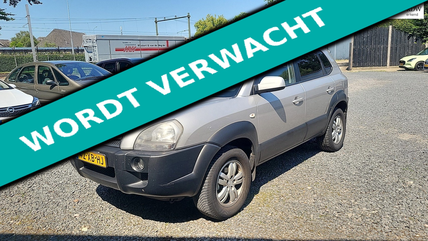 Hyundai Tucson - 2.0i Dynamic 142.000km. Airco Cruise PDC Trekhaak 1400kg. - AutoWereld.nl