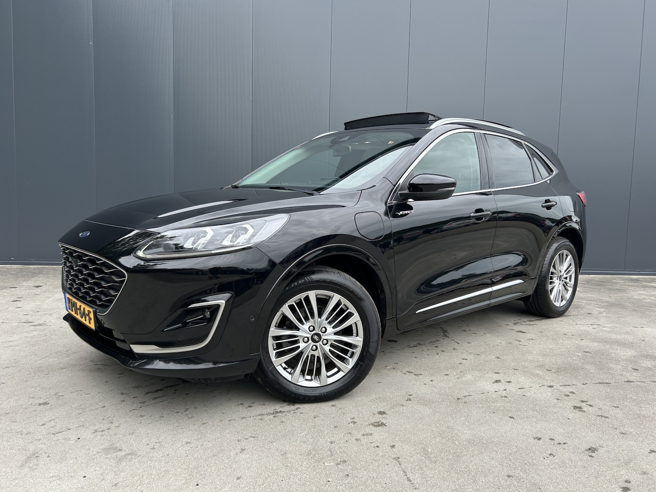 Ford Kuga - 2.5 PHEV Vignale 1e EIGENAAR PANO DAK CAMERA MEMORY STOEL LEER ADAP CRUISE NAVI ECC ST LIN - AutoWereld.nl