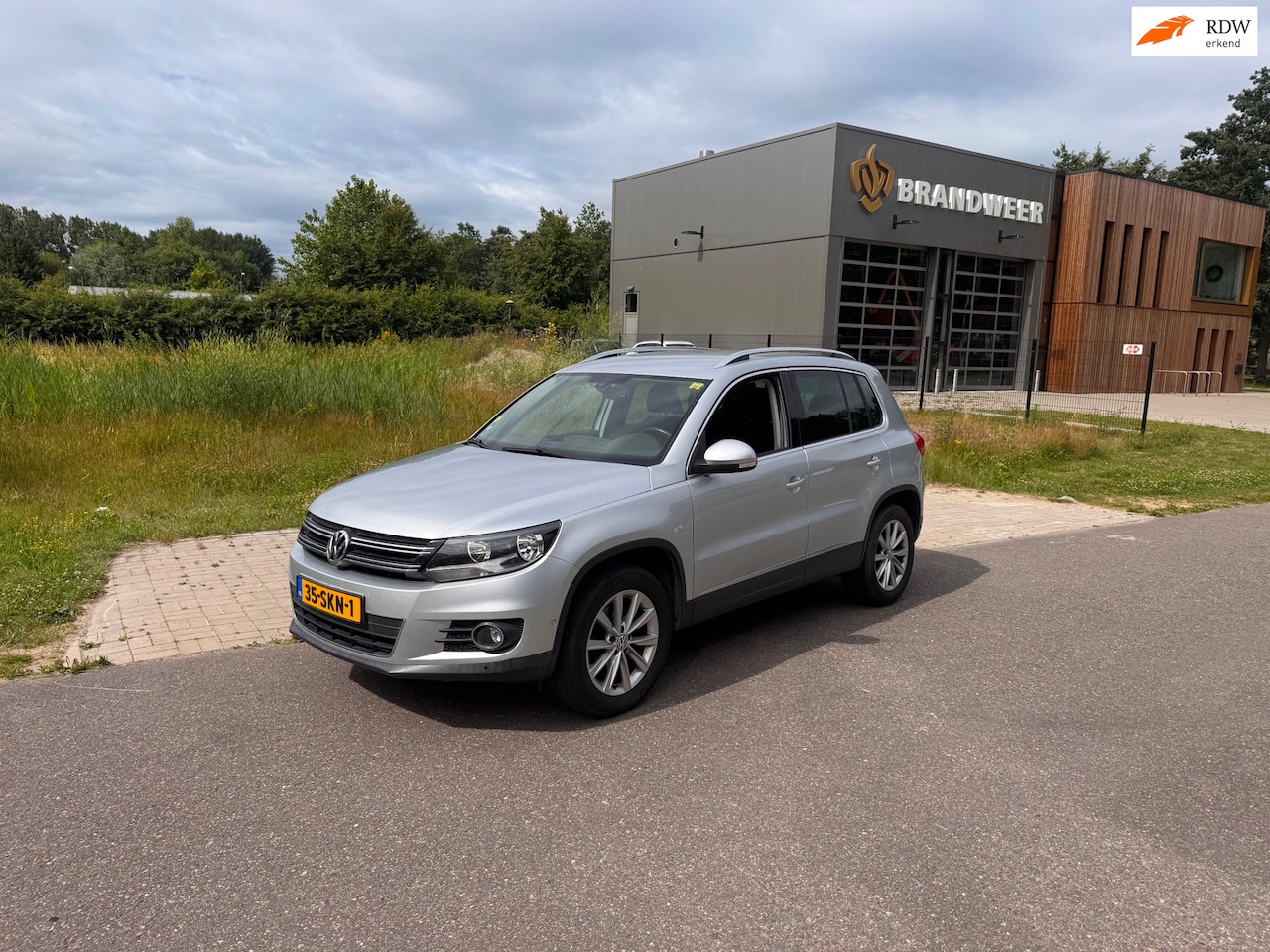 Volkswagen Tiguan - 2.0 TDI Sport&Style Clima.Navi - AutoWereld.nl