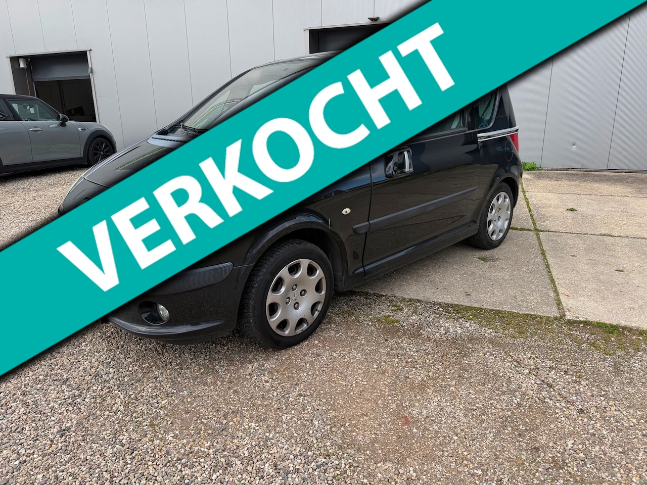 Peugeot 1007 - 1.4 Gentry met airco - AutoWereld.nl