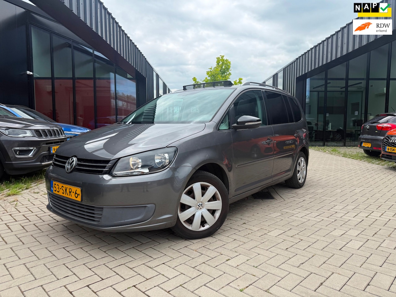 Volkswagen Touran - 1.4 TSI 7 persoons Pano Airco Navi Nwe APK NAP - AutoWereld.nl