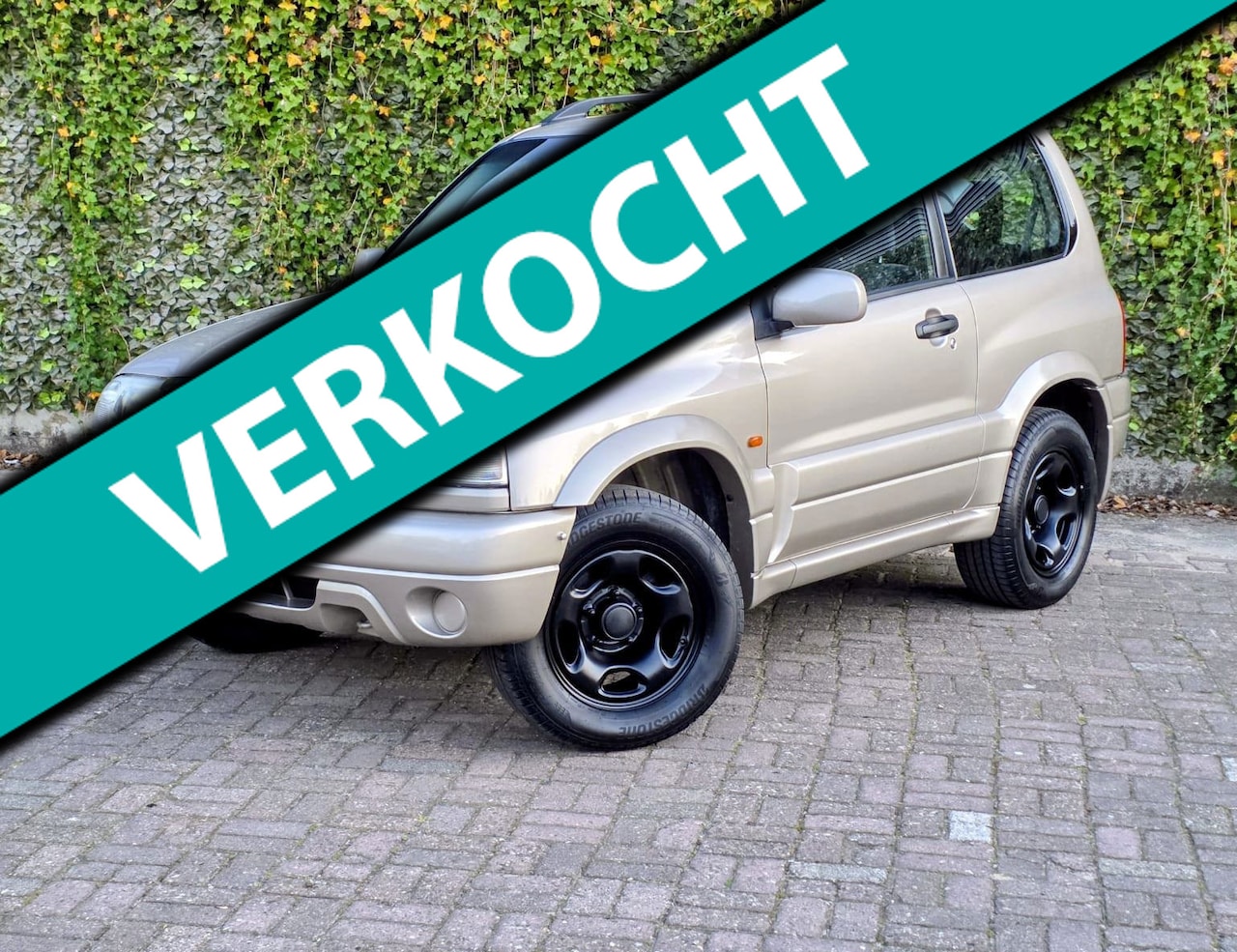 Suzuki Grand Vitara - 2.0 Metal Top Automaat Airco APK Sport Velgen - AutoWereld.nl