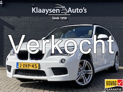 BMW X1 - sDrive20i High Executive 184 pk AUT. | panoramadak | navigatie | trekhaak | beige leder in