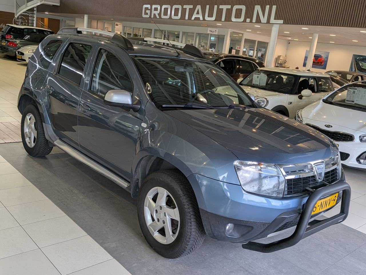 Dacia Duster - 1.6 Lauréate Airco, Stuurbekrachtiging - AutoWereld.nl