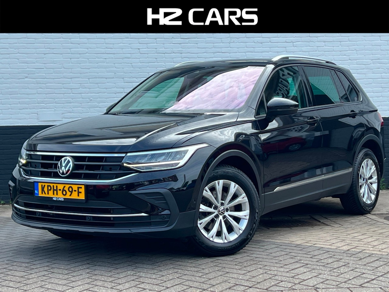 Volkswagen Tiguan - 1.5 TSI Life Camera|Keyless|Massage|ACC|Clima|Parelmoer - AutoWereld.nl