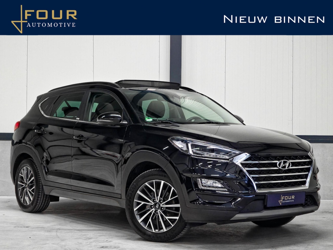 Hyundai Tucson - 1.6 T-GDI 4WD | Trekhaak | Panoramadak | Winter | Matrix | - AutoWereld.nl