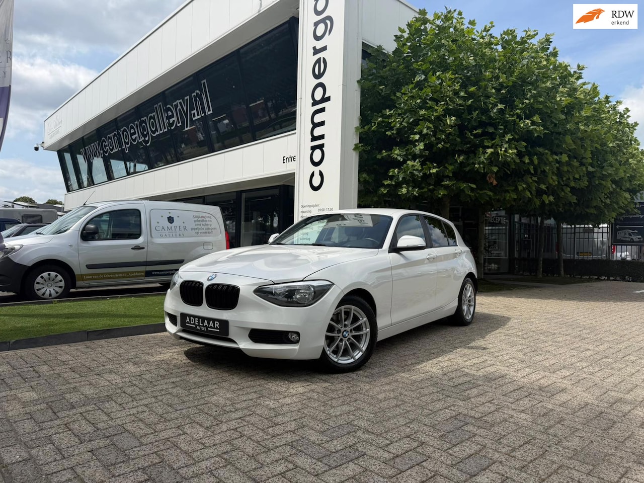 BMW 1-serie - 116i l STOELVERWARMING l AIRCO l PARKEERSENSOREN l MULTIMEDIA - AutoWereld.nl