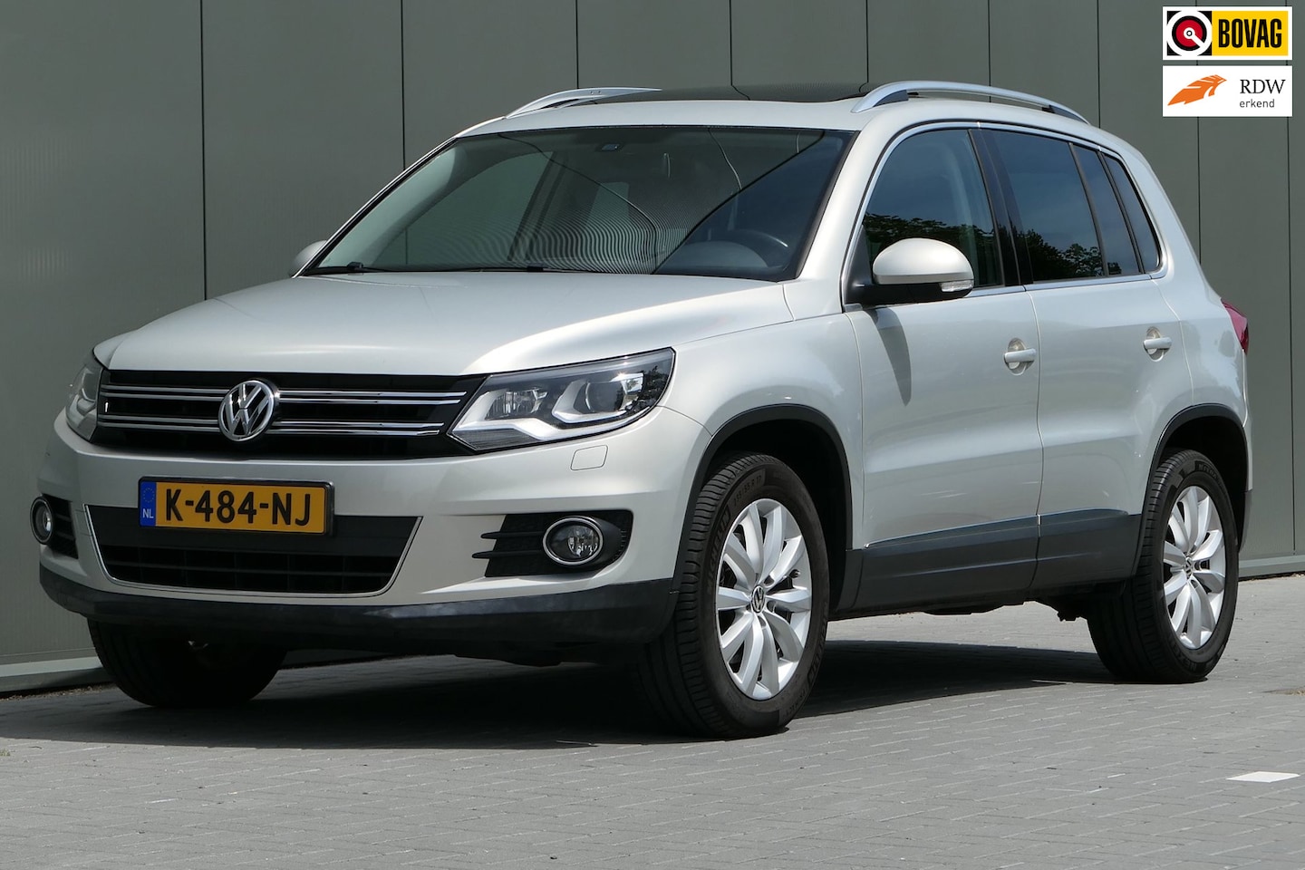 Volkswagen Tiguan - 2.0 TSI Sport&Style 4Motion Pano Cruise Navi Leder - AutoWereld.nl