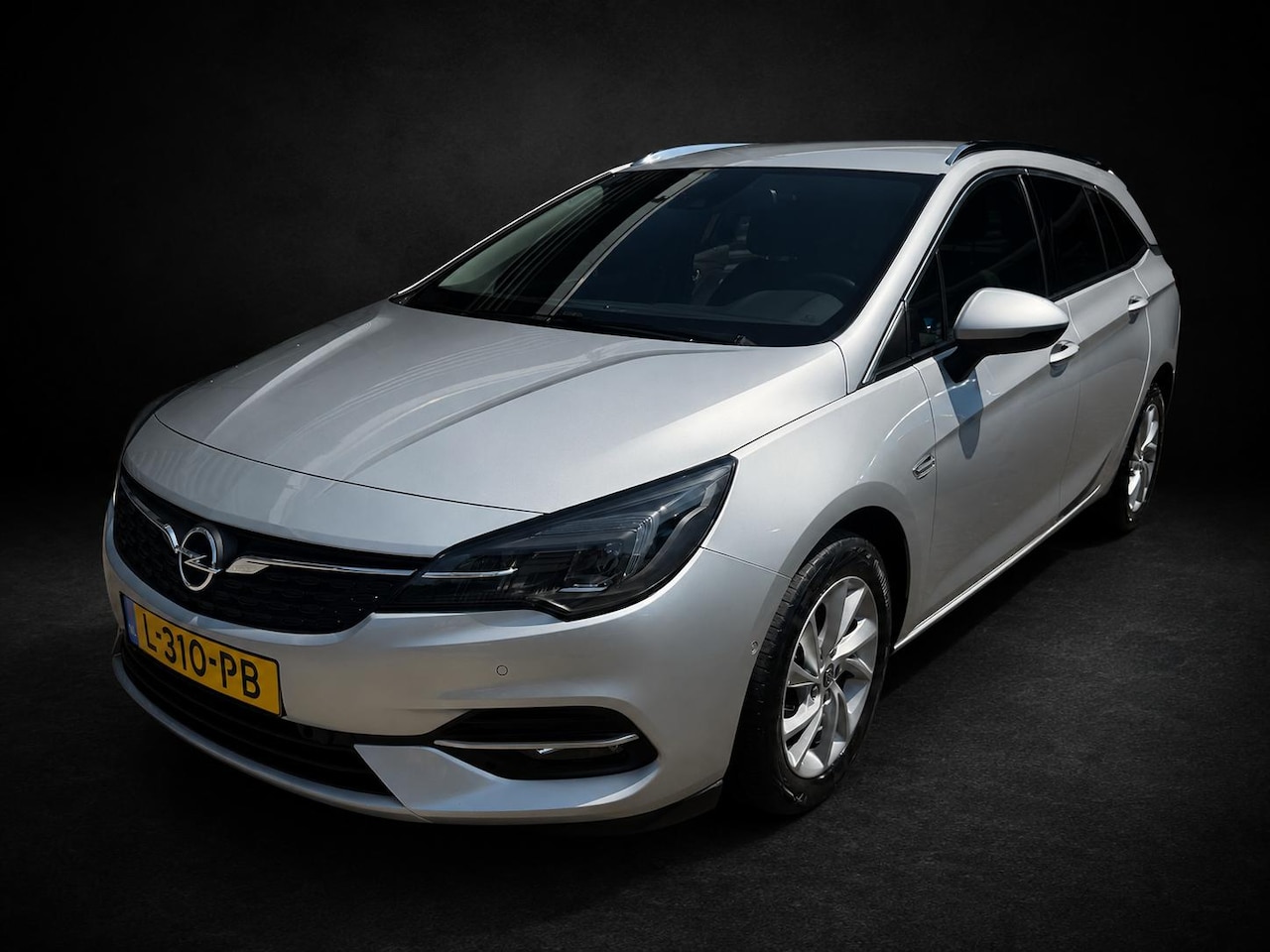 Opel Astra Sports Tourer - 1.2 Business Executive 1.2 Business Executive - AutoWereld.nl