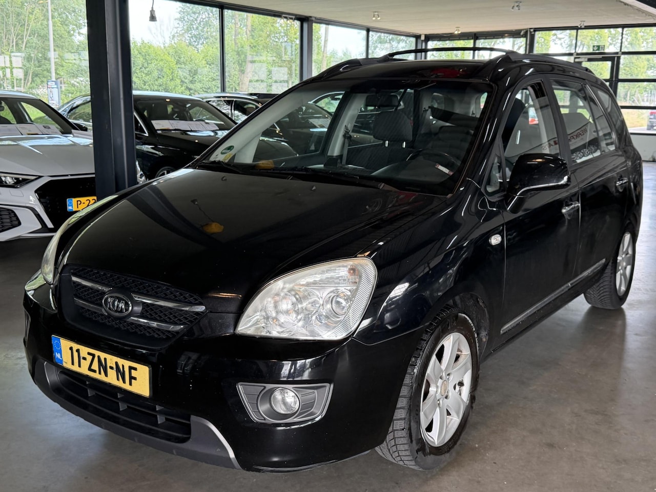 Kia Carens - 2.0 CVVT X-ecutive 7p. 2.0 CVVT X-ecutive 7persoons. - AutoWereld.nl