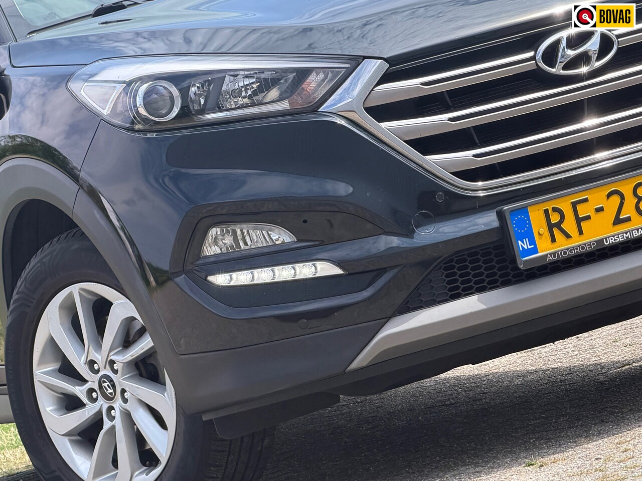 Hyundai Tucson - 1.6 GDi Comfort - Phantom Black - Seatheat/Nav/Mirror - Chique - AutoWereld.nl