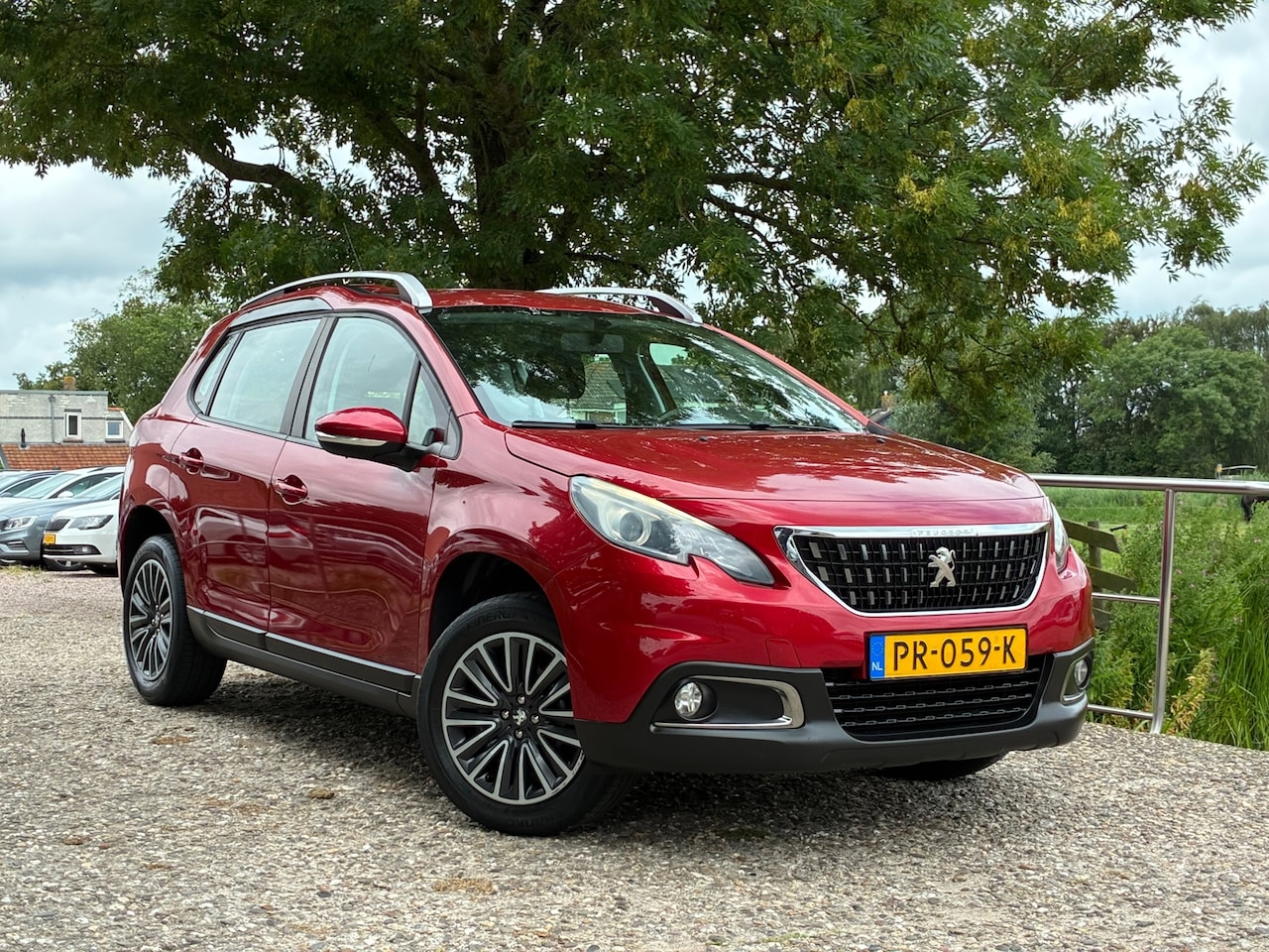 Peugeot 2008 - 1.2 PureTech Blue Lion | Carplay + Navi + Clima + Cruise nu €6.975,-!! - AutoWereld.nl