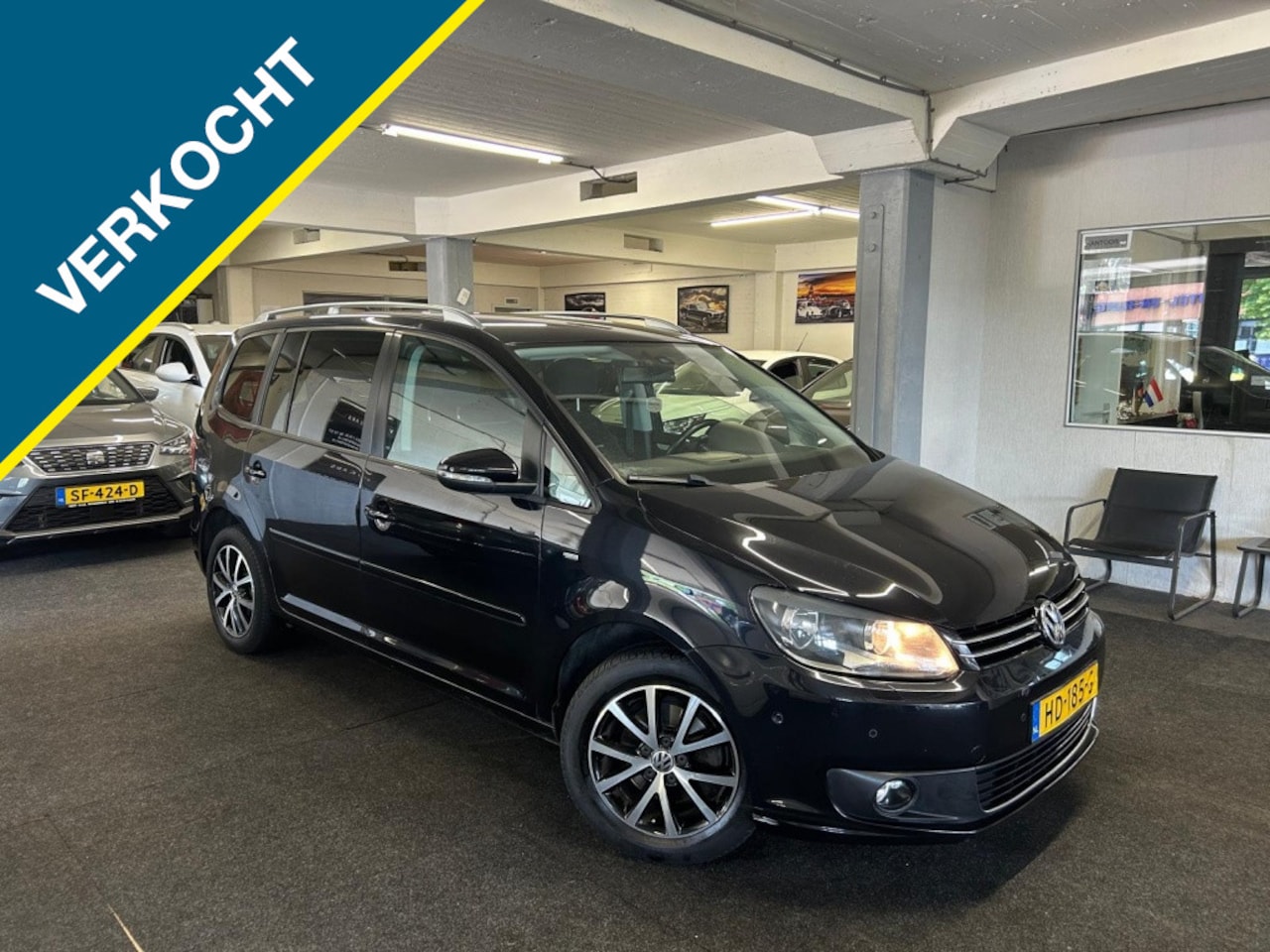 Volkswagen Touran - 1.2 TSI Highl. BM*7persoons*Navi*Trekhaak - AutoWereld.nl