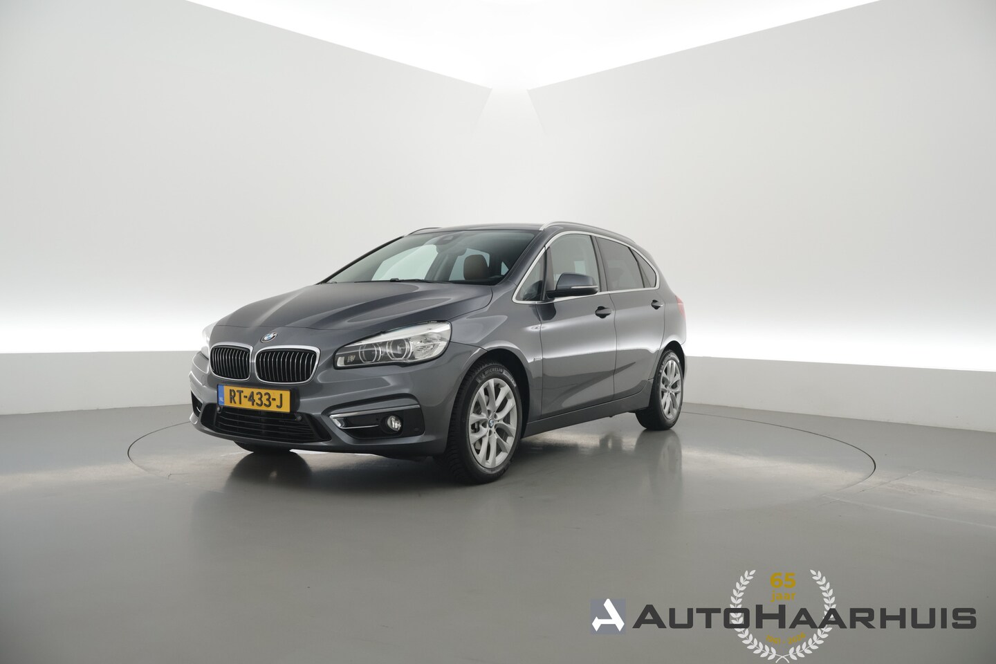 BMW 2-serie Active Tourer - 218i Luxury High Ex. | Rijklaar! | Orig. NL | Trekhaak | HUD | Memory | Camera+PDC | Stoel - AutoWereld.nl