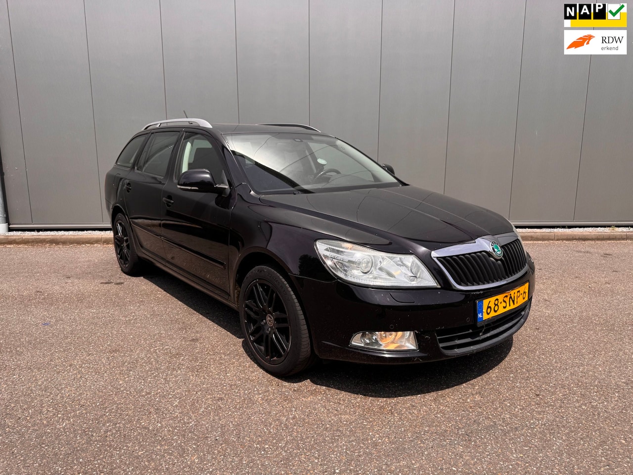 Skoda Octavia Combi - 1.2 TSI Elegance navi clima xenon open dak - AutoWereld.nl