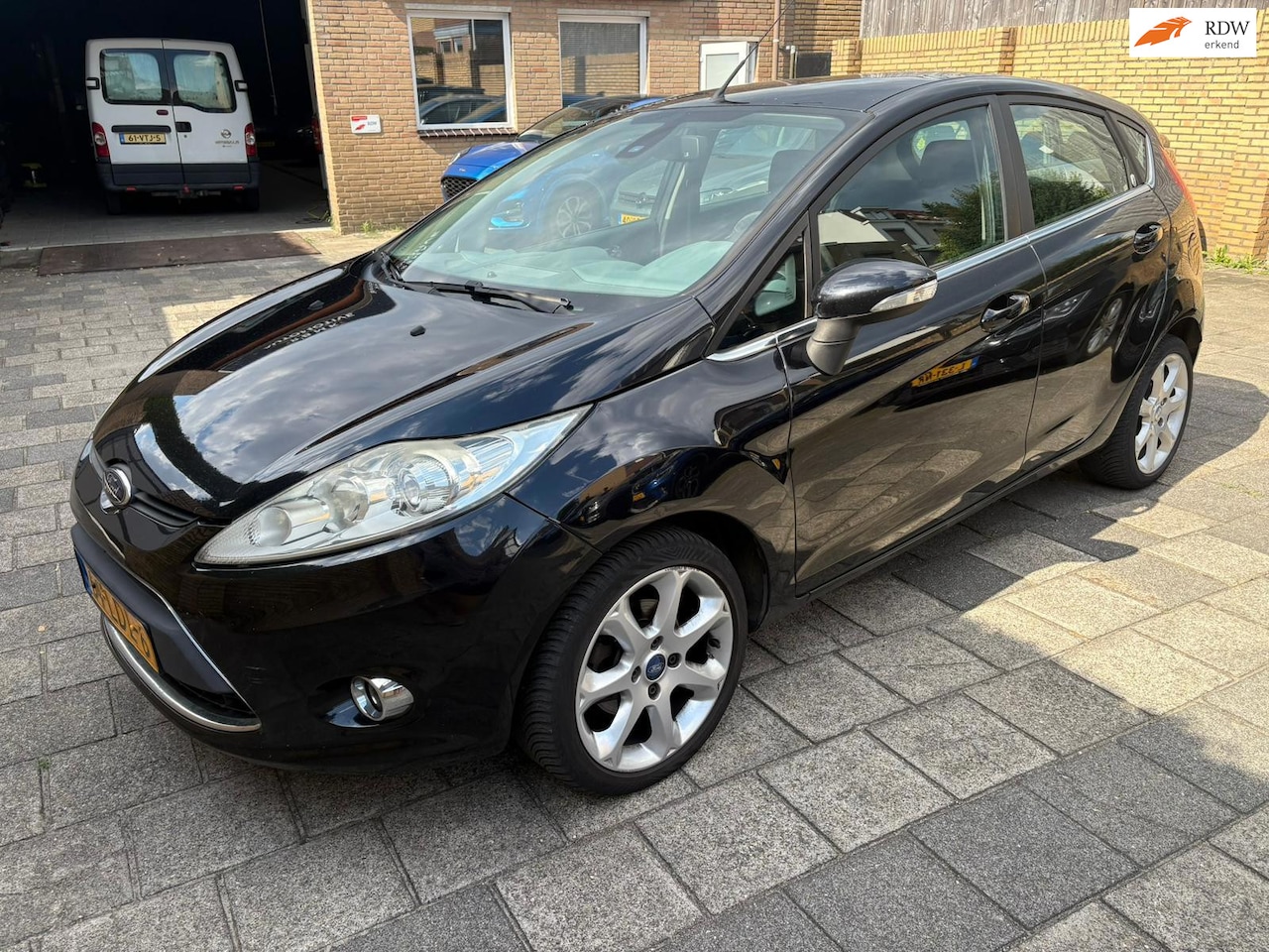 Ford Fiesta - 1.6 Ghia 1.6 Ghia - AutoWereld.nl