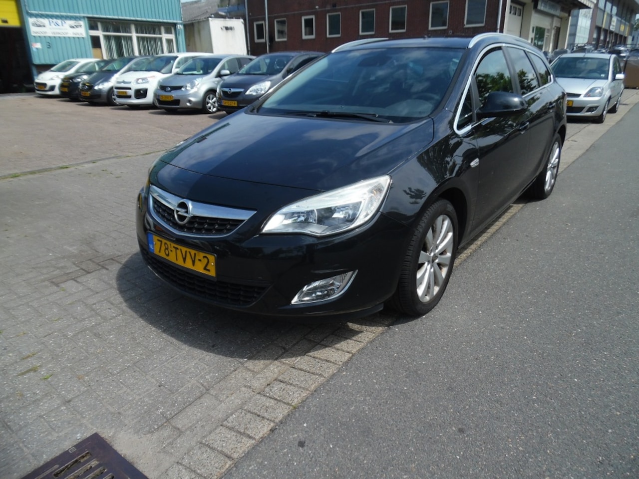 Opel Astra Sports Tourer - apk 5.27 1.4 Cosmo navi airco - AutoWereld.nl