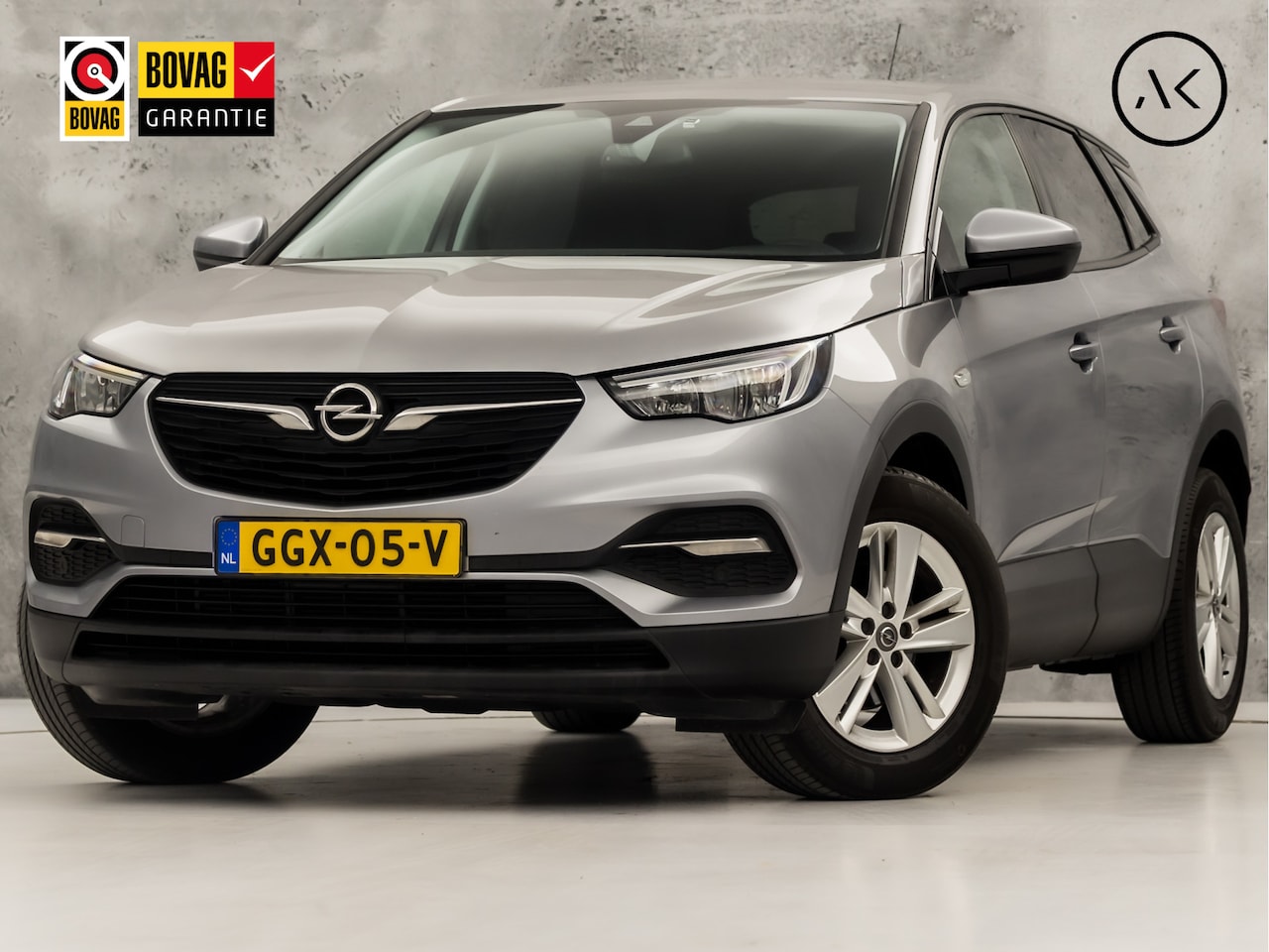 Opel Grandland X - 1.2 Turbo Sport (APPLE CARPLAY, NAVIGATIE, GETINT GLAS, CRUISE, SPORTSTOELEN, ARMSTEUN, LM - AutoWereld.nl