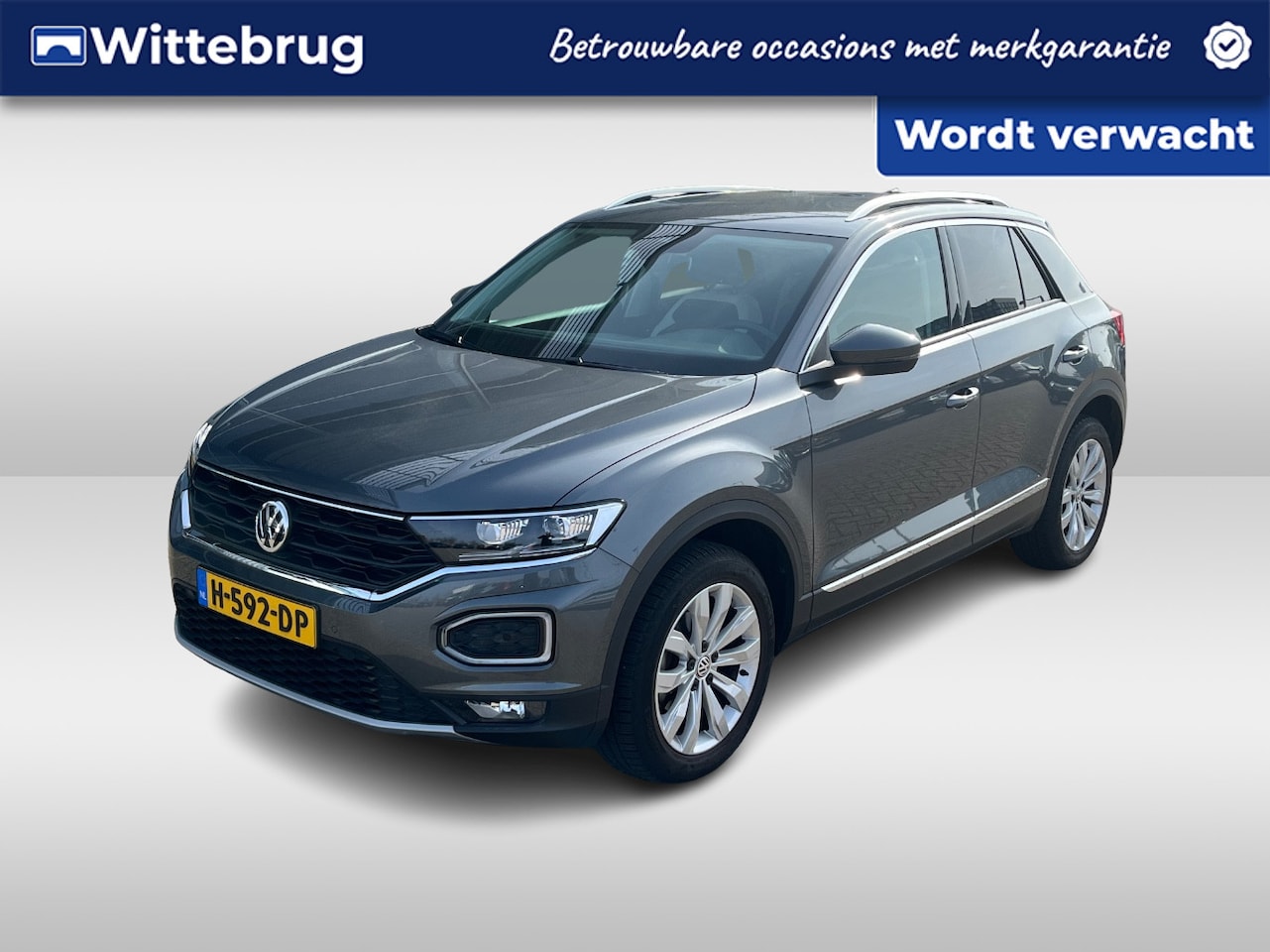 Volkswagen T-Roc - 1.5 TSI Sport / Digitaal dashboard / Navigatie / App connect / Camera / Parkeersensoren V+ - AutoWereld.nl
