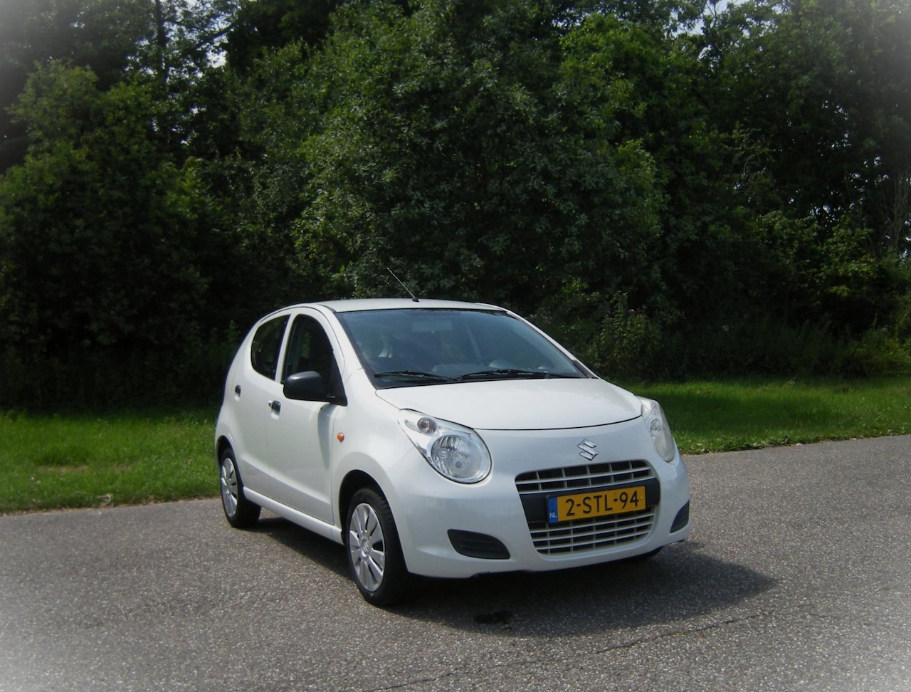 Suzuki Alto - 1.0 Comfort EASSS . 5 Drs . Airco . van Eerste eigenaar . metalic . - AutoWereld.nl