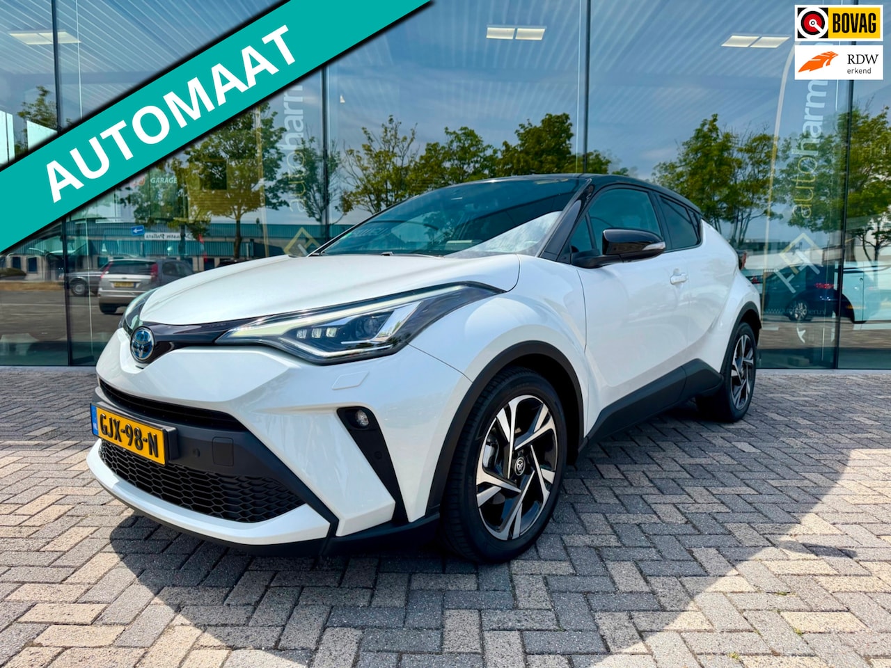 Toyota C-HR - 1.8 Hybrid Style Bi-Tone, CarPlay, Camera, Stoel-stuurverw, - AutoWereld.nl