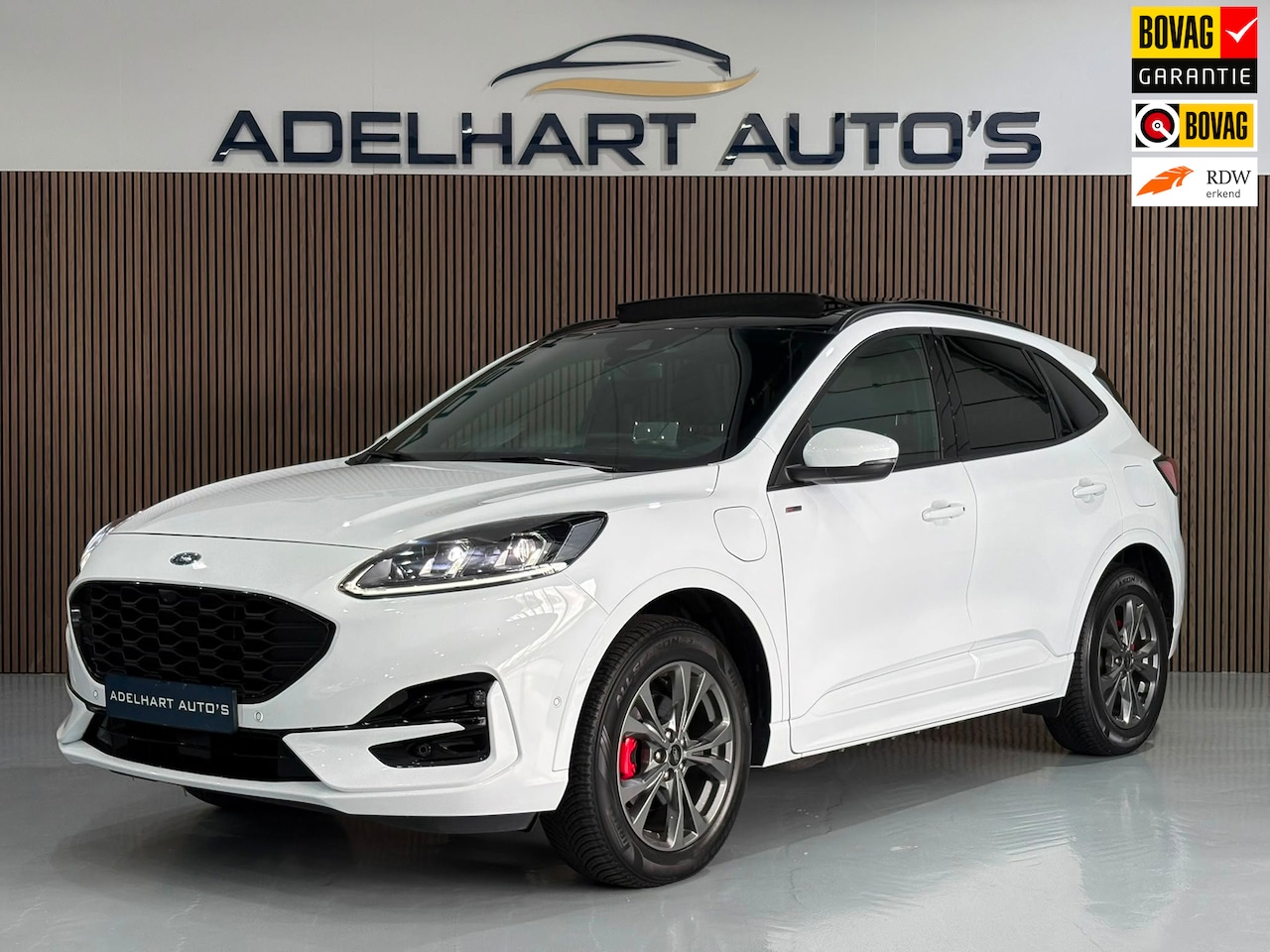 Ford Kuga - 2.5 PHEV ST-Line X Automaat / Panorama dak / Adaptive Cruise / Climate control / etc… - AutoWereld.nl