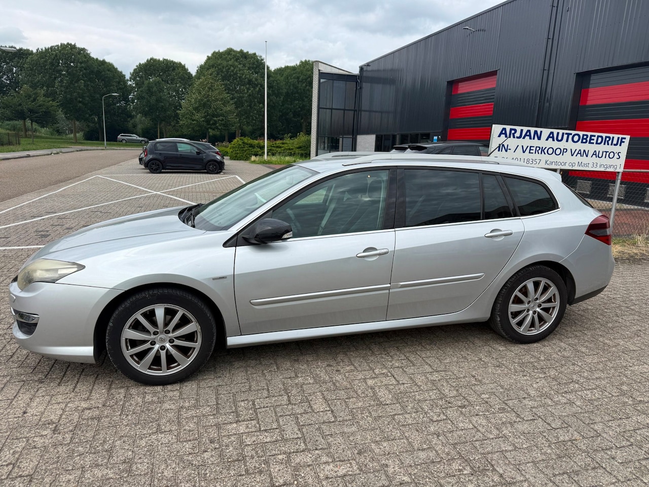 Renault Laguna Estate - 1.5 dCi Executive BOSE - AutoWereld.nl
