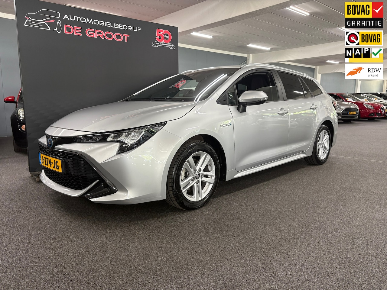 Toyota Corolla Touring Sports - 1.8 Hybrid Active/ NL auto/ Automaat/ Trekhaak/ Achteruitrijcamera - AutoWereld.nl