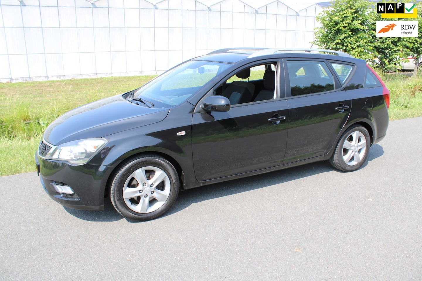 Kia Cee'd Sporty Wagon - 1.4 CVVT Navigator Plus Pack 1.4 CVVT Navigator Plus Pack - AutoWereld.nl