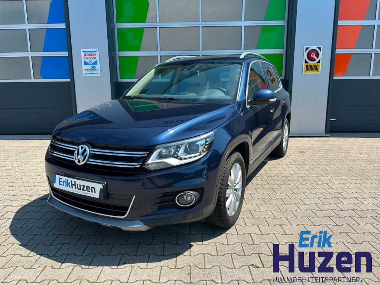 Volkswagen Tiguan - 1.4 TSI Sport&Style 1.4 TSI SPORTenSTYLE - AutoWereld.nl